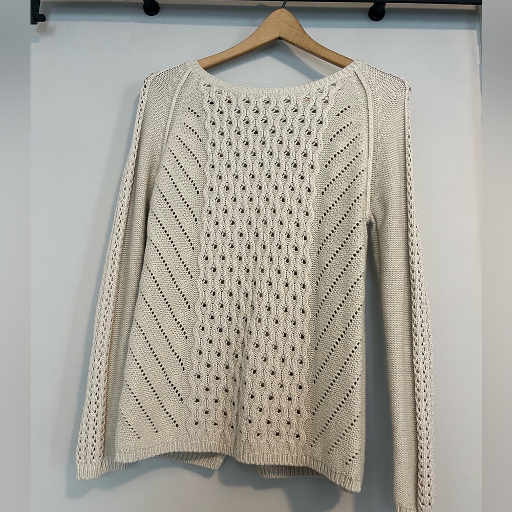 Alya Cream/Beige knit sweater with split back. Size Small.